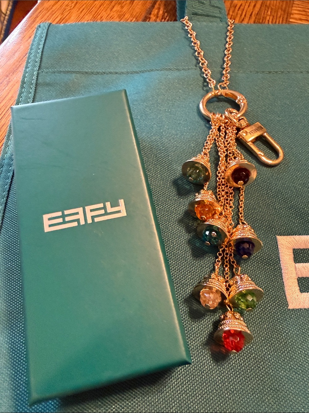 Effy Teal Canvas Logo Tote with Gold color bag charm with 8 Effy bell charms. - Picture 5 of 6